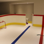 The custom hockey rink features NHL grade acrylic walls.